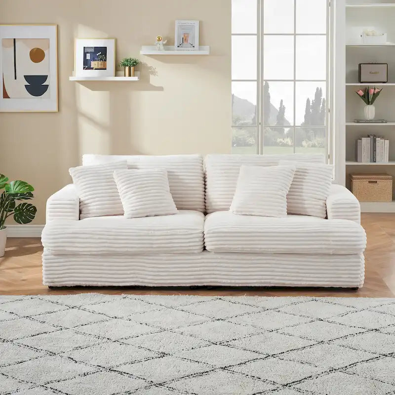 Canapé 3 places en velours côtelé blanc avec 4 coussins décoratifs