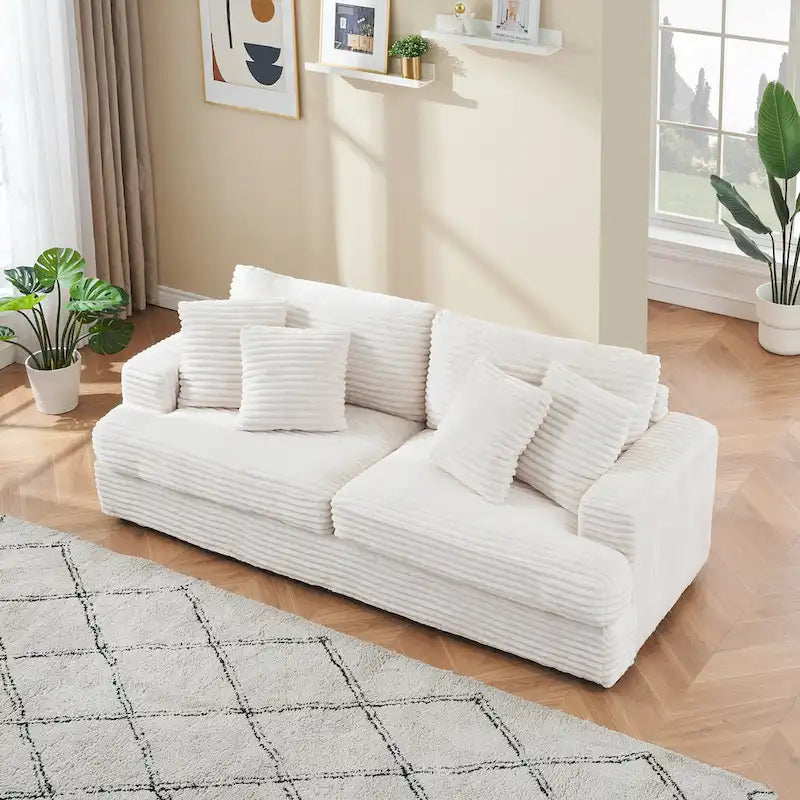 Canapé 3 places en velours côtelé blanc avec 4 coussins décoratifs