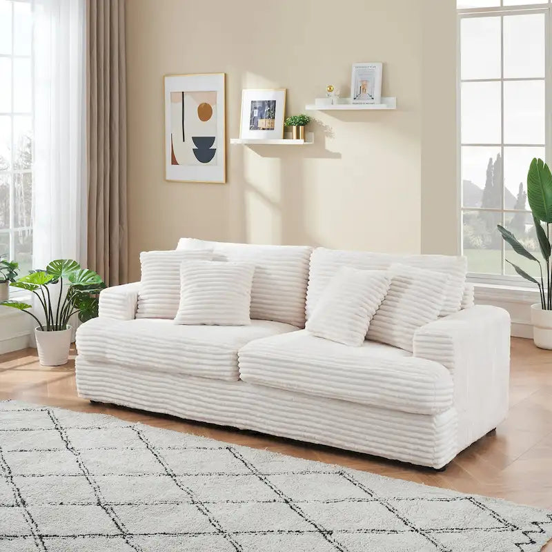 Canapé 3 places en velours côtelé blanc avec 4 coussins décoratifs