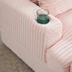 Fauteuil simple en velours côtelé rose avec pouf et porte-gobelet